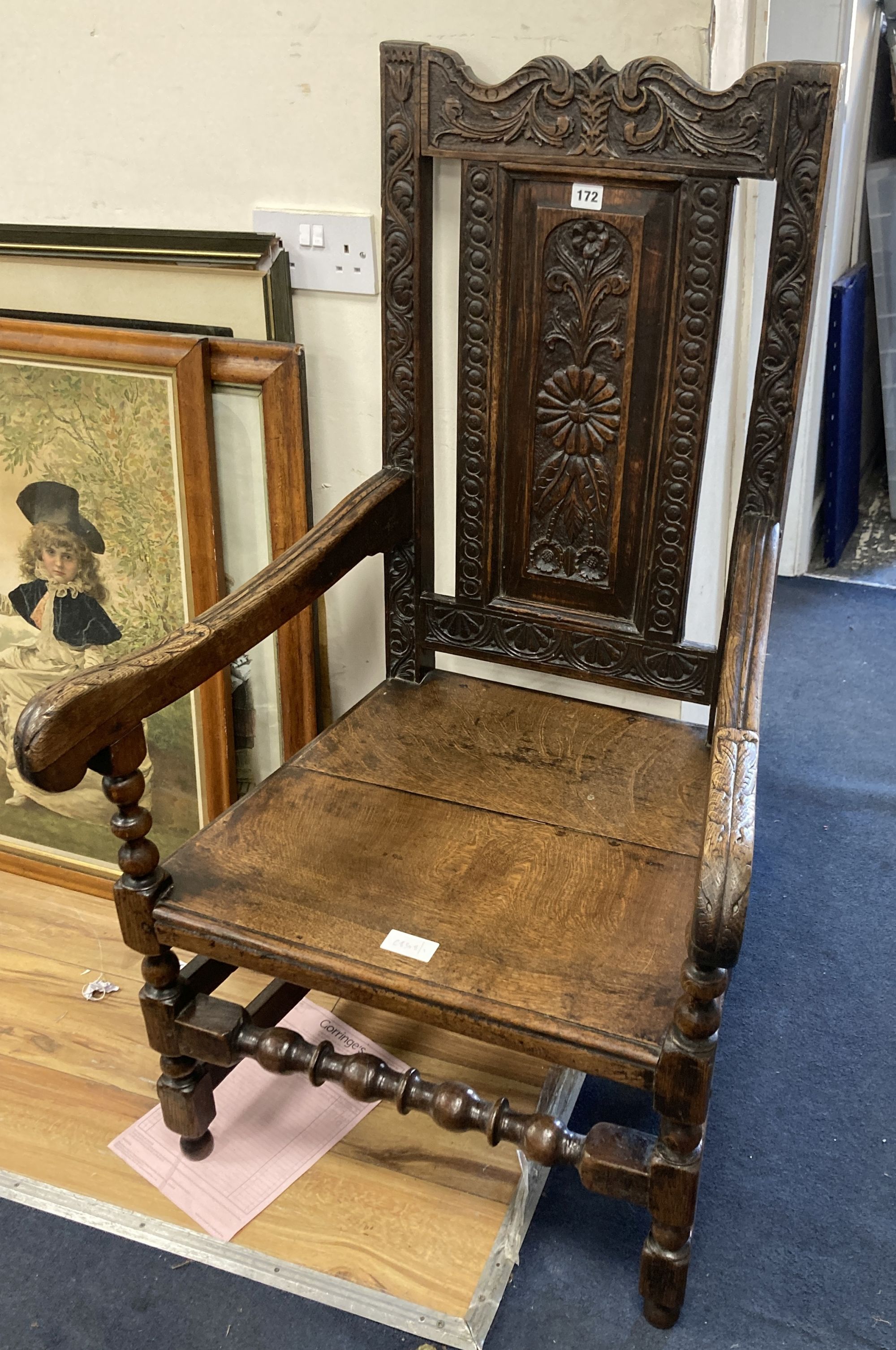 A 19th century oak Wainscot chair, width 64cm depth 49cm height 110cm